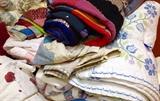 Lots of linens. Several handmade quilts.