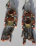 Antique earrings loaded with various stones.