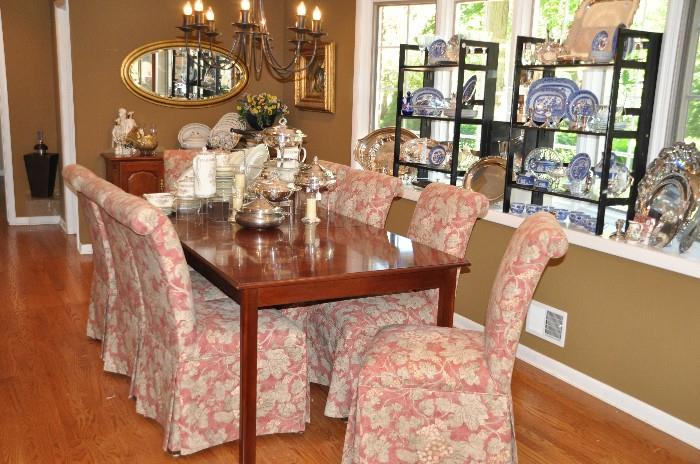 Drexel dining table with 2 leaves and custom pads with 8 slipper chairs by Design Master