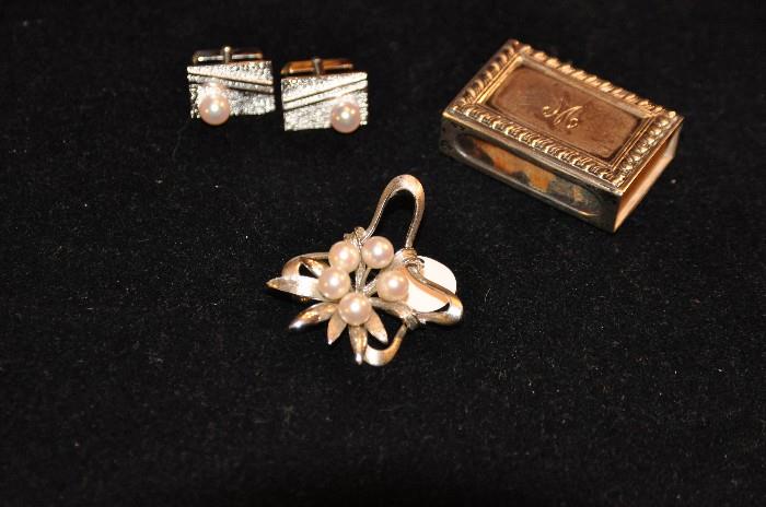 Sterling Silver availble (Cuff Links, Cartier matchcover, and Brooch)