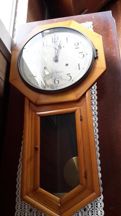 old Seth Thomas clock with maple case