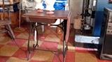 Sewing table with iron base