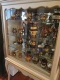 Curio Cabinet with Copper Lusterware Collection