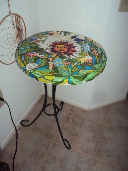hand painted table with iron base 
