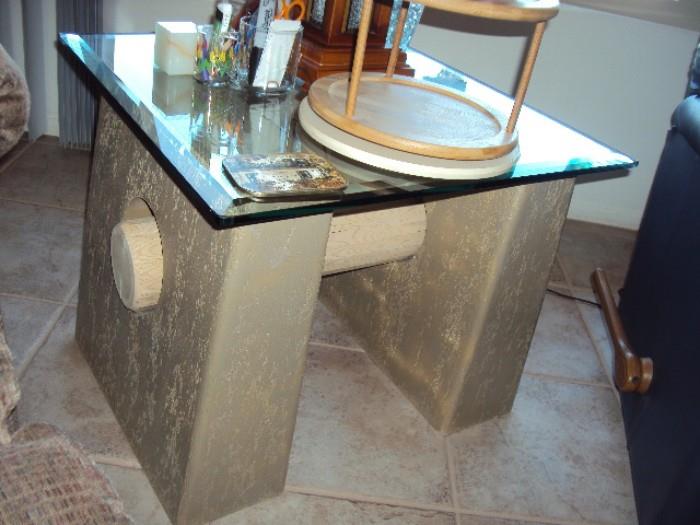 Southwest glass top table with log running through the middle