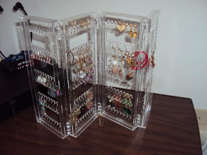 earrings and other costume jewelry. Also 3 gold and diamond rings 