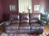 Acrylic rug approximately 8'x10'.  Leather recliner NOT for sale.