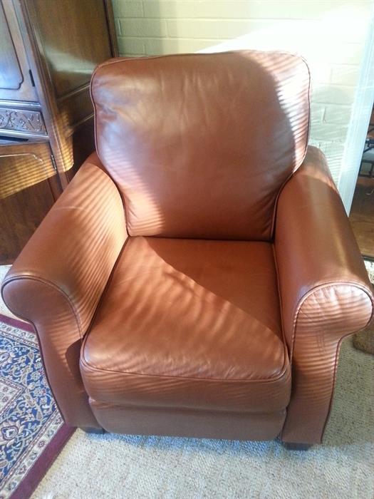 Carmel brown leather recliner.  