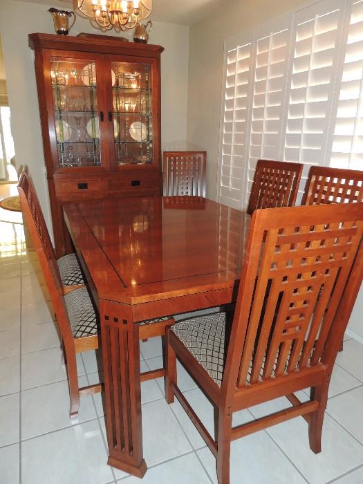 Stickley Table and 6 Chairs with 2 Table leaves and Table Pads. Matching Stickley China Hutch
