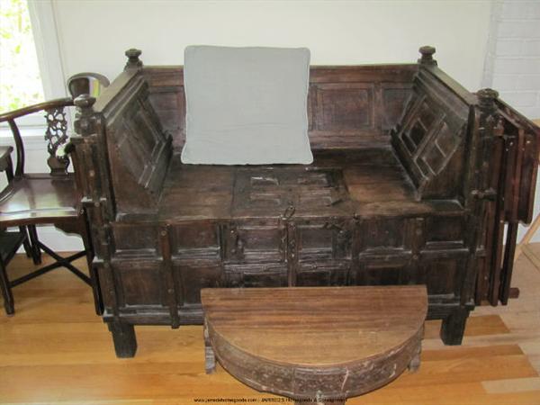 This dark wood chest is from India and is described as a "Seat Chest." It was purchased in Kuwait.  The owner of the shop it was purchased from felt it was made in the late 1800's. It is completely hand carved.
