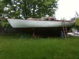 The sailboat at 24 Washington Street is a:
H28 ketch sailboat. Built in 1963 in Japan of wood.
Beautiful (when refinished) varnished teak cabin, teak decks and wooden
masts. Recent Mainsail. & mizzen, electronics. 30 ft LOA, diesel powered. Sleeps 4. Asking $5,000