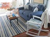 2 Rocking Chairs

Sleeper Loveseat

Rug

Coffee Table