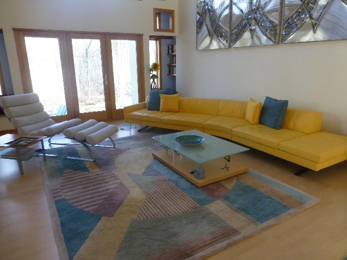 Custom yellow leather couch sold by LIMN in San Francisco; designed by Poltrona Frau-Kennedee Coffee Table - Ligne Roset sold by Adesso; designed by Pascal Mourgue  