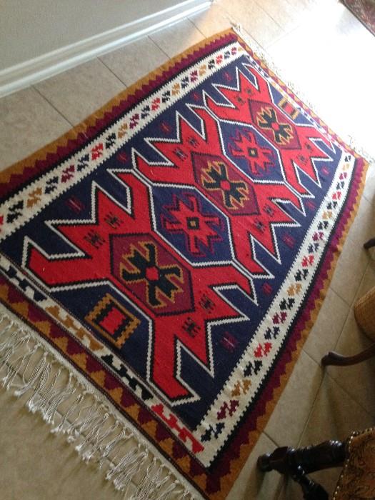 Collection of handmade wool and silk rugs