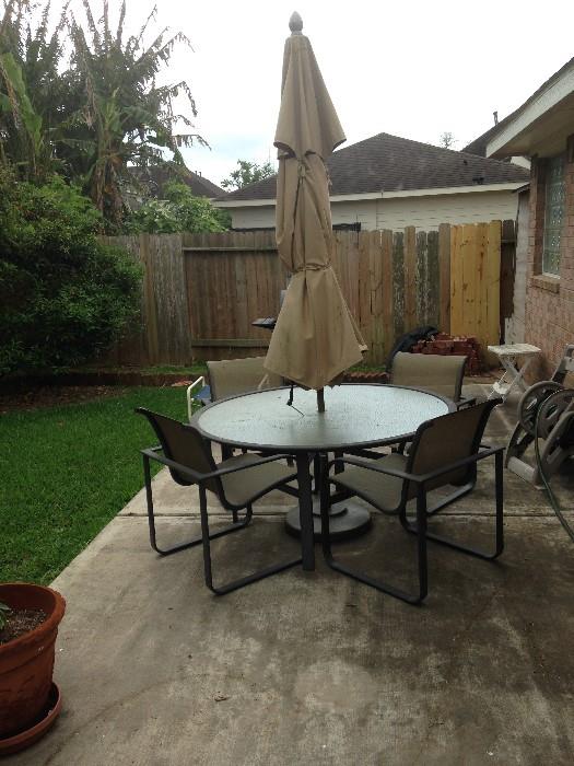 Brown Jordan patio furniture, 4 chairs with new slings, 9' double pulley umbrella, glass top table