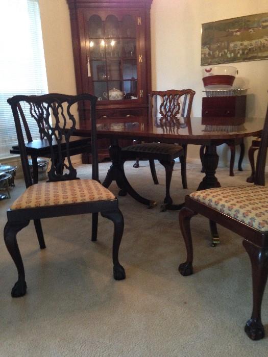 Mahogany dining room table double pedestal, 3 leaves extends to seat 12 with custom protective pads