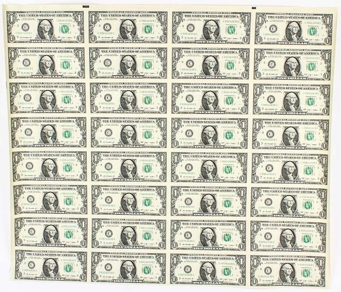 Lot #99, Coin Uncut Sheet of (32) 2009 C Series $1 US Notes
 This is a very hard to find sheet of (32) uncut and uncirculated 2009 (C District) $1.00 US Treasury Federal Reserve Bank Notes rolled in plastic sleeve. This note sheet was printed from the Philadelphia, PA (C) Federal Reserve District. The sheet is 8 bills tall by 4 bills wide and each $1.00 note has the portrait of President George Washington on the Obverse and the Great Seal of the United States on the Reverse. These Federal Reserve Notes bear the signatures of Rosie Rios and Timothy Geithner. This set is in pristine condition with no signs of wear. From the internet, “The USA $1 bill is a denomination of U.S. currency. It is the most common denomination in the United States currency. George Washington, painted by Gilbert Stuart, is currently featured on the obverse, and the Great Seal of the United States is featured on the reverse. The $1 bill has this design since 1963, when it first became a Federal Reserve Note. The 