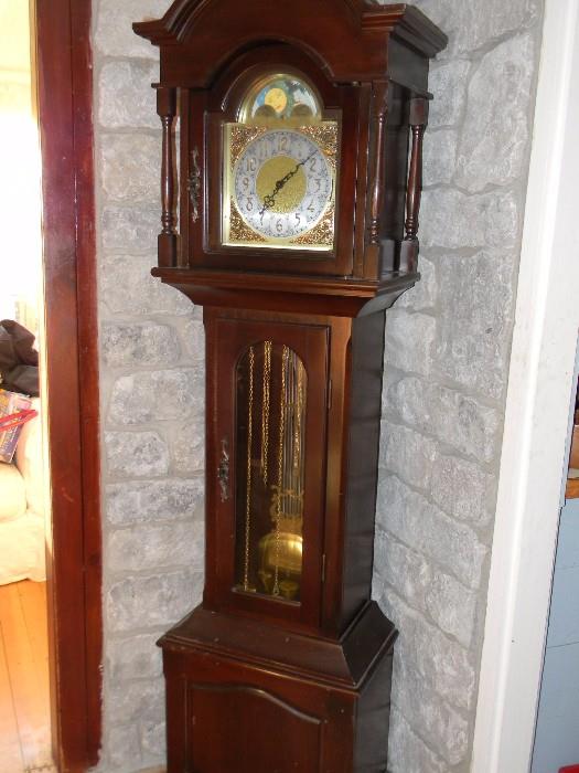 King Arthur Grandfather Clock.  Works and chimes.