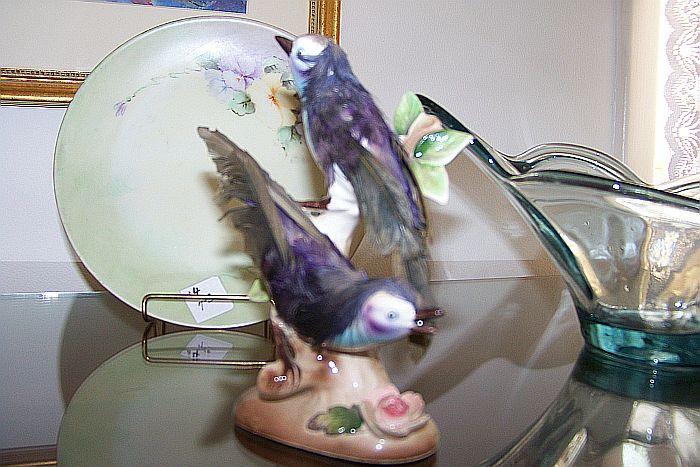 Unusual bird figurine(one of two) with real feathers applied to the birds