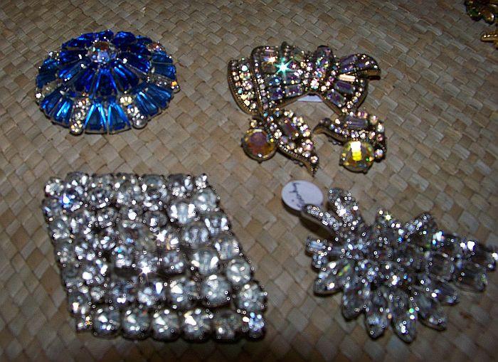 Beautiful rhinestone pins and pin sets - upper right picture is a Hollycraft pin and earring set - 