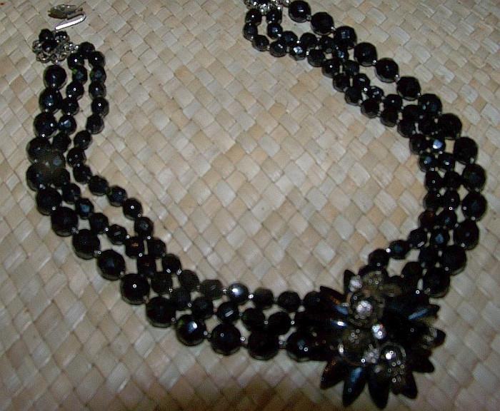 A wonderful French jet bead necklace by DeMario - highlighted with rhinestones in the center medallion