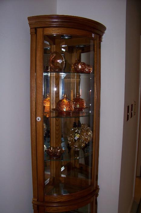 One of a pair of oak curio cabinets - well made -