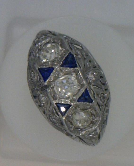 Gorgeous Platinum C. 1910 dinner ring - has 3 diamonds and 4 triangular sapphires.  1 ct. total weight of diamonds