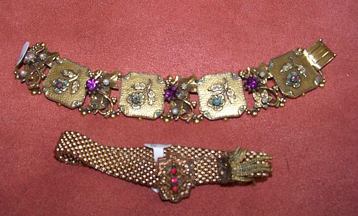 Bottom bracelet is a Victorian era mesh slide bracelet - top bracelet is from the 1950's