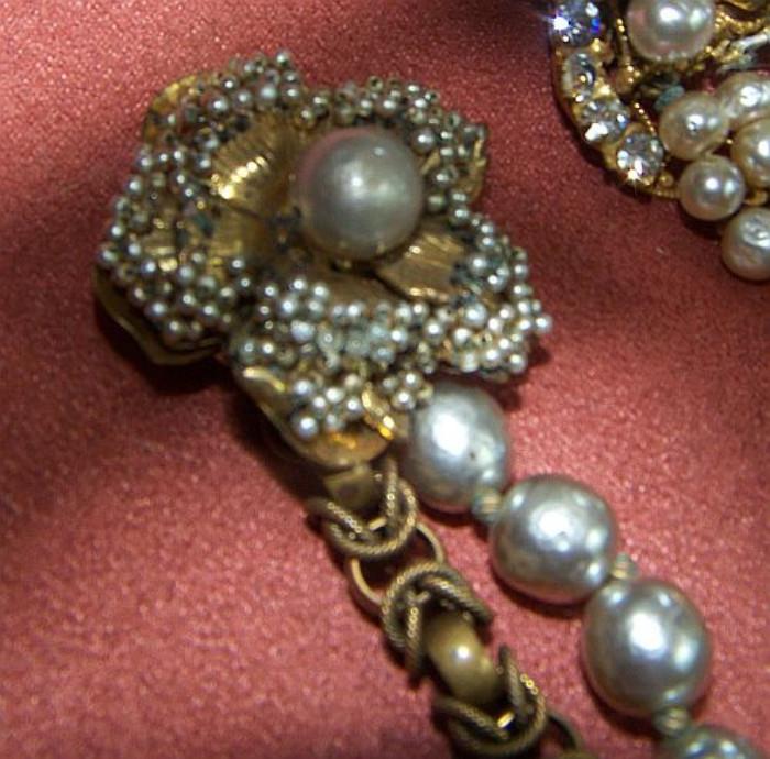Close-up of the clasp of one of the bracelets