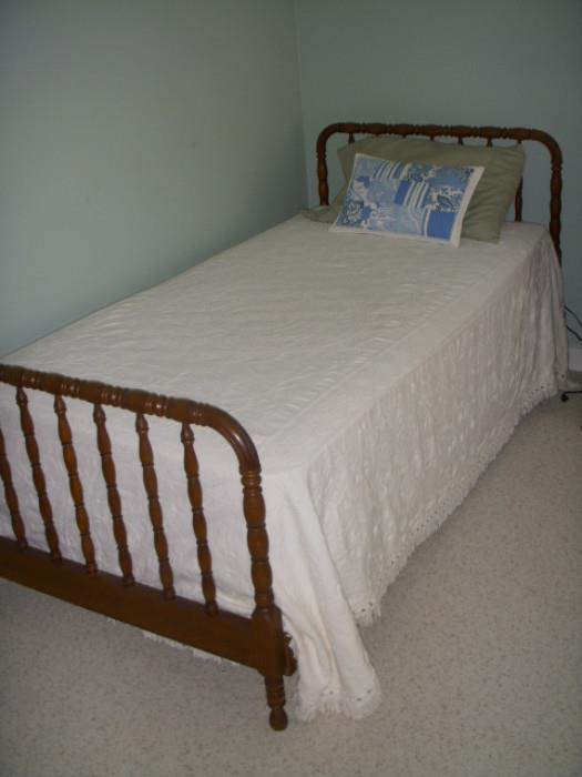 One of a pair of "Jenny Lind" twin beds