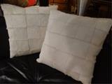 Pair natural white cowhide accent pillows