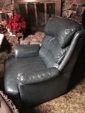 One of a pair of leather recliners