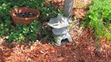 One of the Garden Statuary that are available in this sale.  As pictured small Concrete pagoda and a Terra Cotta pot