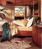 Striking Thomasville Kallista Bedroom Set - Beautiful Red Oak 4 post Canopy King Size Bed with rich Chestnut color finish and unique Canopy with a place for a 13" size TV built in and double mirror headboard, California King Mattress & Boxsprings.  Also pictured is 2 of 2 Oval Night Stands with 2 doors & adjustable shelf storage.   Other pieces to bedroom  set are a matching triple dresser, matching Chest of Drawers, Armoire - all pictured elsewhere in this collection. This set is a real showpiece for any master bedroom