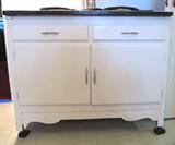 Vintage Hoosier style cabinet with flour bin, drawer and door storage;