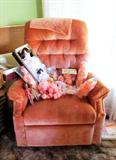 Tufted Occasional Arm Chair with apricot colored upholstery; Stuffed animals shown are also available