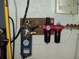 Various gauges and valving for air compressor and pneumatic tool applications