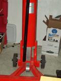 2 Ton Capacity Air End Lift ideal for lifting front or rear ends of vehicles by the bumpers. with steel saddles that adjust between 36" - 50" widths to accommodate a wide variety of vehicle applications...saddle arms are reversible for low height loads; automatic mechanical safety lock engages at different lift levels