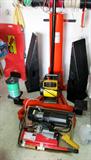 2 Ton Capacity Air End Lift ideal for lifting front or rear ends of vehicles by the bumpers. with steel saddles that adjust between 36" - 50" widths to accommodate a wide variety of vehicle applications...saddle arms are reversible for low height loads; automatic mechanical safety lock engages at different lift levels; also shown are new in box electric power winch with cable and clevis hook, and electric power hoist with cable and clevis hook which are available. also shown is an electric blower,  Auto ramps and creeper which are also available.  Other items pictured are available too.