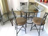Glass & Metal Dinette Set - Table with  Glass Top with Scalloped edges, Metal base; Four Matching Metal Chairs with cushion seats; Also pictured is a matching End Table with Glass Top and Metal base