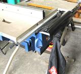 Ryobi 10" Portable Table Saw with Wheeled Stand.  15 AMP motor, built in folding stand with wheels, rip capacity : 30 " to the right, 12" to the left; onboard storage of mitre gauge, rip fence, and push stick; 2 1/2" dust port and dust bag