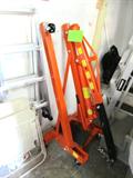 1 Ton Foldable Shop Crane & Engine Hoist.  Ram capacity 3 Ton;  Boom extends from 36" - 50"; Crane Height adjusts from 70 3/4" to 82 3/4";  Swivel casters; Folds up for easy storage