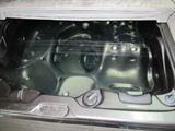 Interior view of Vision Crest Spa / Hot Tub - Model 3780 Cygnus...approx. 83 x 92" x 37" ;  weight is approx. 825 empty and 4,157 filled; Features:Large 5/6 person seating capacity spa with ergonomically designed shell to permit a large group... family or friends to enjoy it, lots of jets (approx. 87) of differing sizes and placements for everyone to enjoy too; 2 - 2 speed 5.0 HP  pumps; Has a foot therapy system feature; Nice waterfall feature; pillow headrests; electrical requirements 220v - 50Amp;   Driftwood Gray Lucite Cabinet for low maintenance and a  Solar cover to keep heat in.  It also has a set of Spa Steps for easy entry and exiting of the spa.  Note: you will need to arrange for  removal and setup...this will include a privacy temporary wall (not floor to ceiling), although the wall does not need to be demolished