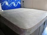 View of Solar Cover for Vision Crest Spa / Hot Tub - Model 3780 Cygnus...approx. 83 x 92" x 37" ;  weight is approx. 825 empty and 4,157 filled; Features:Large 5/6 person seating capacity spa with ergonomically designed shell to permit a large group... family or friends to enjoy it, lots of jets (approx. 87) of differing sizes and placements for everyone to enjoy too; 2 - 2 speed 5.0 HP  pumps; Has a foot therapy system feature; Nice waterfall feature; pillow headrests; electrical requirements 220v - 50Amp;   Driftwood Gray Lucite Cabinet for low maintenance and a  Solar cover to keep heat in.  It also has a set of Spa Steps for easy entry and exiting of the spa.  Note: you will need to arrange for  removal and setup...this will include a privacy temporary wall (not floor to ceiling), although the wall does not need to be demolished