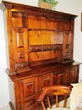 Vintage Colonial Style Hutch by Sugar Hill... Pine with a reddish oak style finish. Hutch has lots of doors, drawers and shelves storage, metal pulls. Hutch is part of matching set including Server / Buffet , Table and six chairs which are pictured elsewhere in this collection.