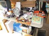 Some of the Office accessories & supplies, sewing notions & sewing books, Sony portable TV. Also small electronics items...clocks, radios.