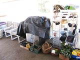 Charmglow Stainless Gas BBQ Grill with Cover and Accessories, propane Tank; Display Rack with some of the collection of Ladies purses...some are vintage...collectible; Some of the collection of basketry that are available in this sale. Patio furniture shown are also available