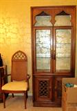 Continental Style Dining Set...includes large dining table with two extra leaves and table pads, 8 matching side chairs with white upholstered seats and woven cane backs with cross hatch style accented tops; matching lighted china cabinet with wood and glass double doors with brass batwing pulls, glass shelves and lower doors storage; matching server