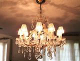 Beautiful large Formal Crystal Chandelier with large and samll crystals, crystal shades, glass arms. You will need to take it down and cap the wiring as part of your purchase of this chandelier...or for an additional fee we can take it down from where it is hung for you...but you will need to arrange for its handing at your home.