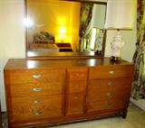 Beautiful Vintage Bedroom Set by American of Martinsville...includes Dresser with golden oak finish and 8 large drawers, 4 small center drawers, and a mirror; two (2) matching two tiered nightstands; Two (2) Single Beds with Single Size Sealy Contessa IV Bed Sets...mattresses, boxsprings, and frames. (Nightstands and Single bed sets are pictured elsewhere in this collection) Accent Table Lamp pictured is also available.